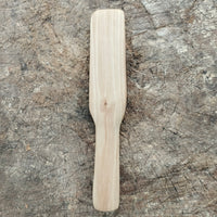Cuchillo de mantequilla de madera de peral, mango visto desde arriba